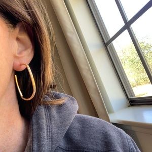 Michael Kors earrings stamped gold with crystal stones